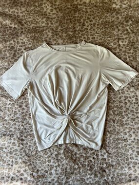 Cream colored lululemon twist front tshirt